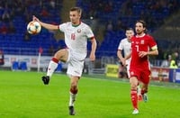 сборная Беларуси по футболу, Макс Эбонг, сборная Уэльса по футболу, Михаил Мархель