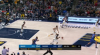 Myles Turner rises to block the shot