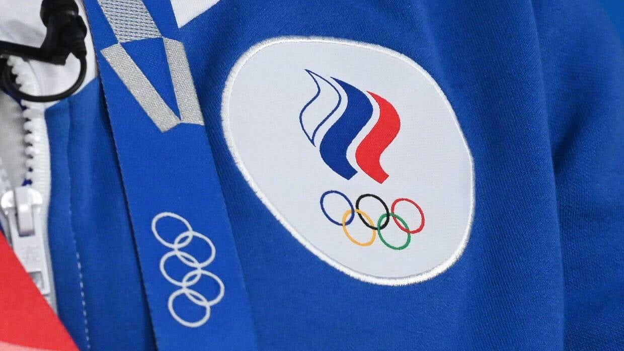 Россия без гимна и под названием ROC на Играх в Пекине, свод принципов МОК о трансгендерах, Рублев проиграл Джоковичу, рост трат МЮ после прихода Рон