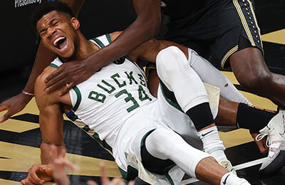 Giannis has played in all NBA Finals games after a horrific knee dislocation.  The consequences of the injury bother him even after three months. thumbnail