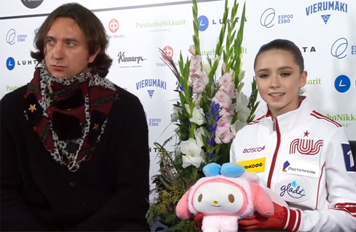 Что за человек в шарфе оказался рядом с Валиевой, когда она получала рекордные оценки?